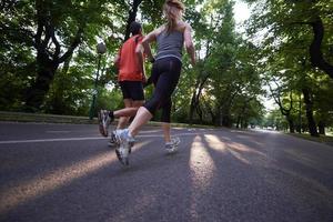 couple jogging outside photo