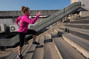 woman jogging on  steps photo