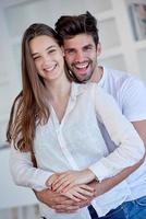 happy young romantic couple have fun arelax  relax at home photo