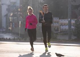 young  couple jogging photo