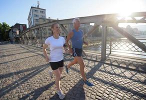 Couple jogging outside photo