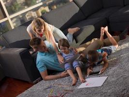 Family in livingroom photo