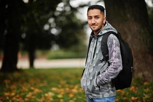 Student kuwaiti man wear at hoodie with backpack. photo