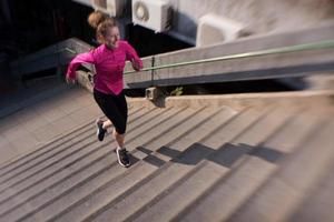 woman jogging on  steps photo