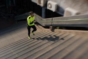 man jogging on stairs photo