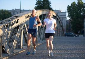 Couple jogging outside photo