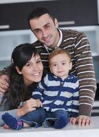 happy young family have fun  at home photo