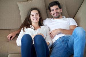 happy young romantic couple have fun arelax  relax at home photo