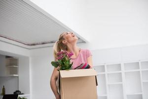 girl moving in the new apartment photo