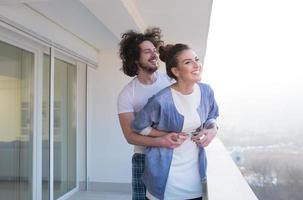 Couple hugging on the balcony photo