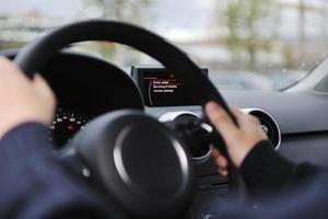 man using car navigation photo