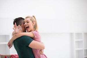 happy Young couple moving in new house photo