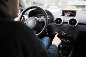 man using car navigation photo