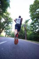 man jogging outside photo