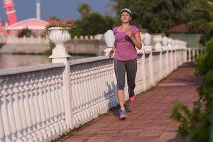 sporty woman jogging photo