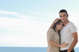 couple relaxing on balcony photo