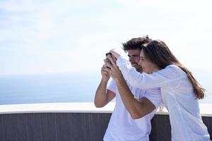 young couple taking selfie with phone photo