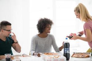 multiethnic group of young people have a lunch break photo