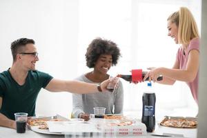 multiethnic group of young people have a lunch break photo