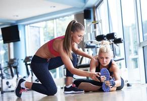 working out with personal trainer photo