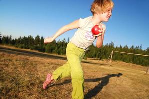 Kid playing outside photo