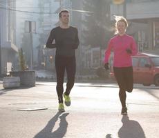 young  couple jogging photo