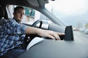 man using car navigation photo