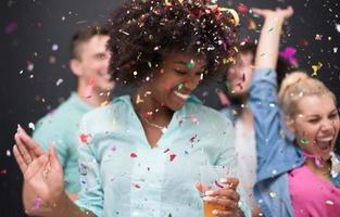 confetti party multiethnic group of people photo