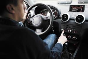 man using car navigation photo