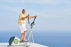 healthy senior man working out photo