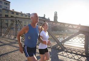 Couple jogging outside photo