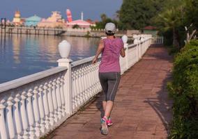 sporty woman jogging photo