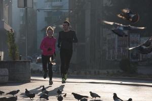 young  couple jogging photo