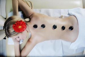 Beautiful young woman in spa photo