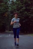 woman  stretching before morning jogging photo