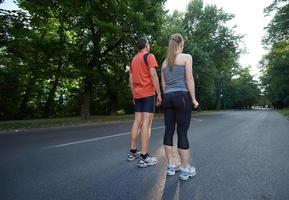 couple jogging outside photo