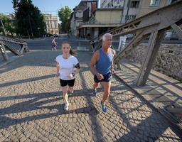 Couple jogging outside photo