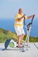 healthy senior man working out photo