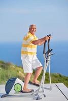 healthy senior man working out photo