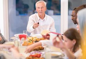 modern multiethnic muslim family having a Ramadan feast photo