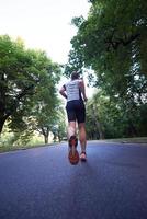 man jogging outside photo