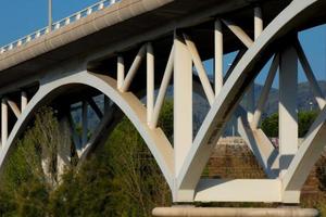 Modern river bridge, an engineering feat that thousands of vehicles pass over daily photo