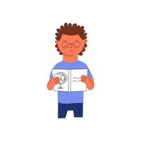 A little boy with glasses reads a book. Character schoolboy is studying. Vector illustration in a flat style.