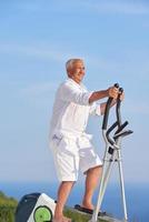 healthy senior man working out photo