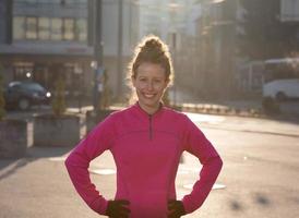 woman  stretching before morning jogging photo