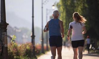 Couple jogging outside photo