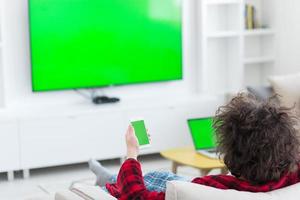 young man in bathrobe enjoying free time photo