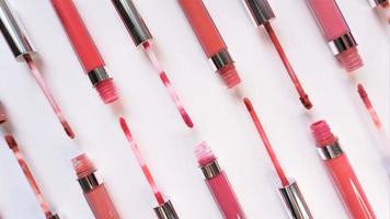 Liquid lipstick artistic display layout on white background photo