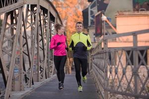 young  couple jogging photo