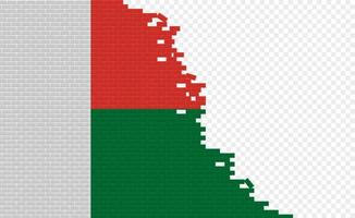 bandera de madagascar en la pared de ladrillos rotos. campo de bandera vacío de otro país. comparación de países. fácil edición y vector en grupos.